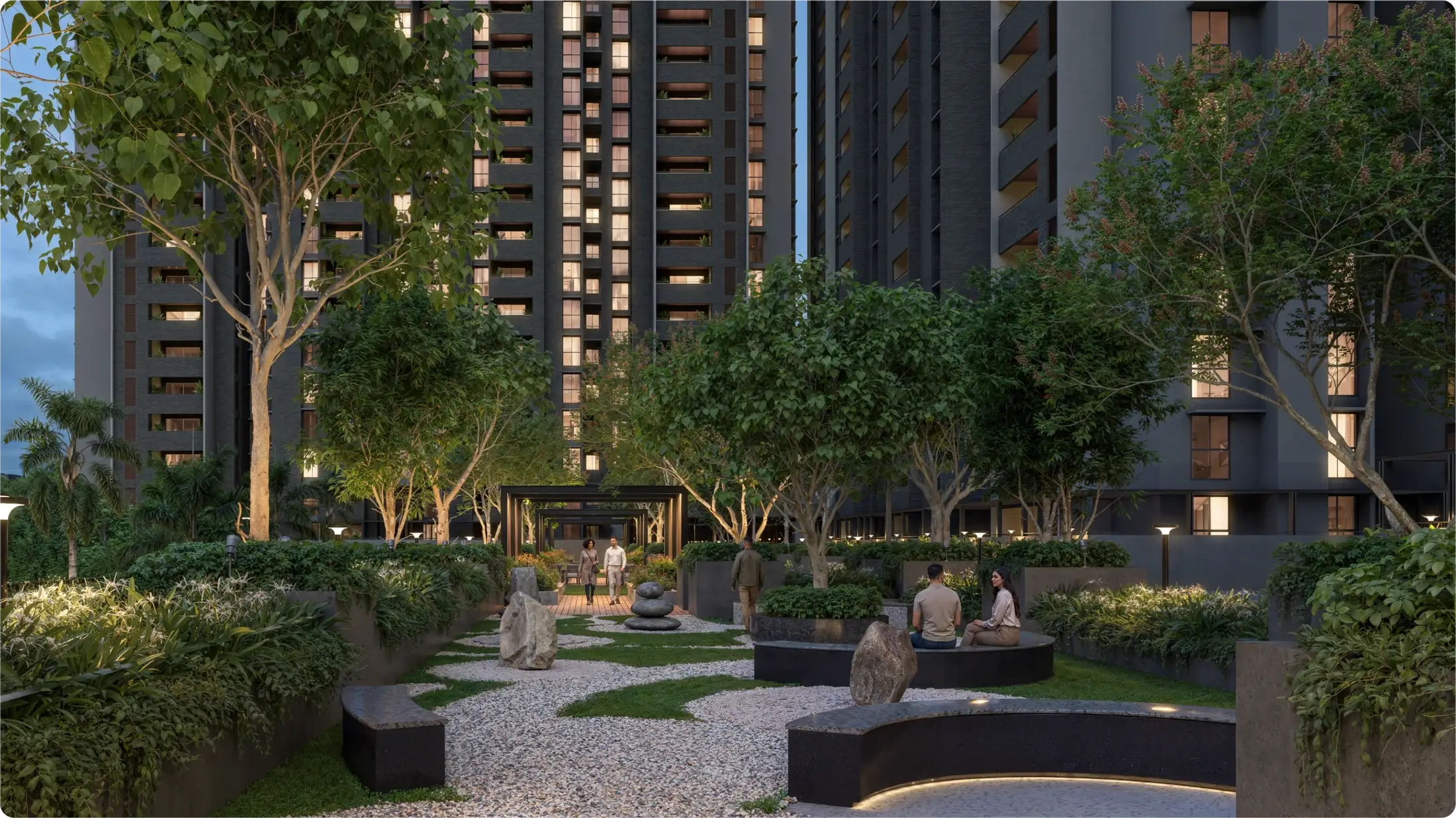Residents in the landscaped central courtyard, with shaded seating among young trees.